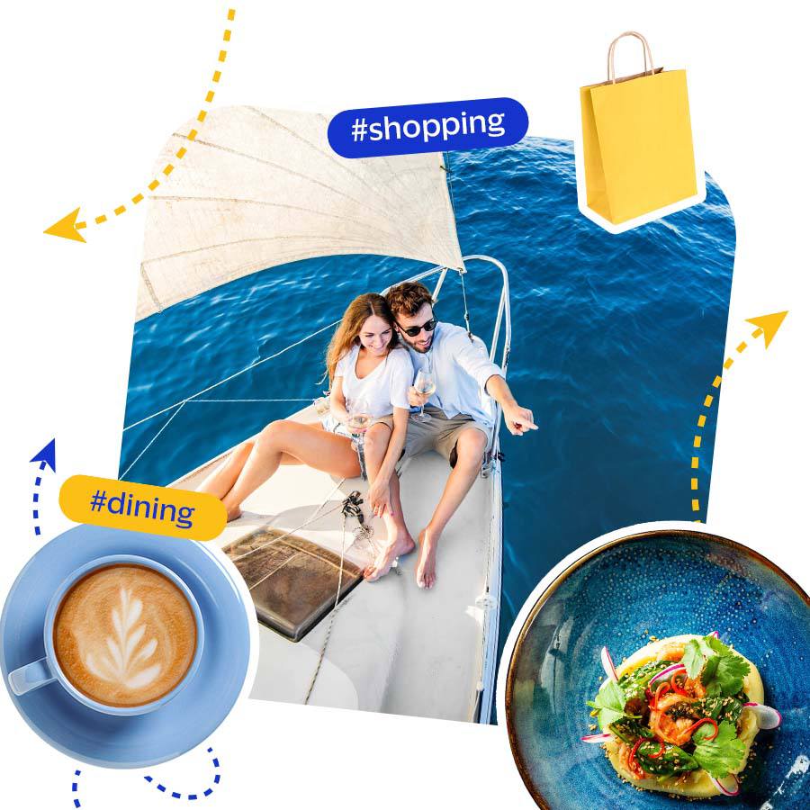 A couple relaxes on a sailboat in clear blue water, enjoying drinks. Surrounding them are icons of coffee, a salad, and a shopping bag, with hashtags #dining and #shopping.